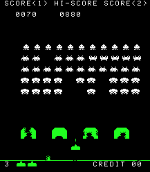 Original Space Invaders playfield with rows of aliens, defensive shields and the player cannon.