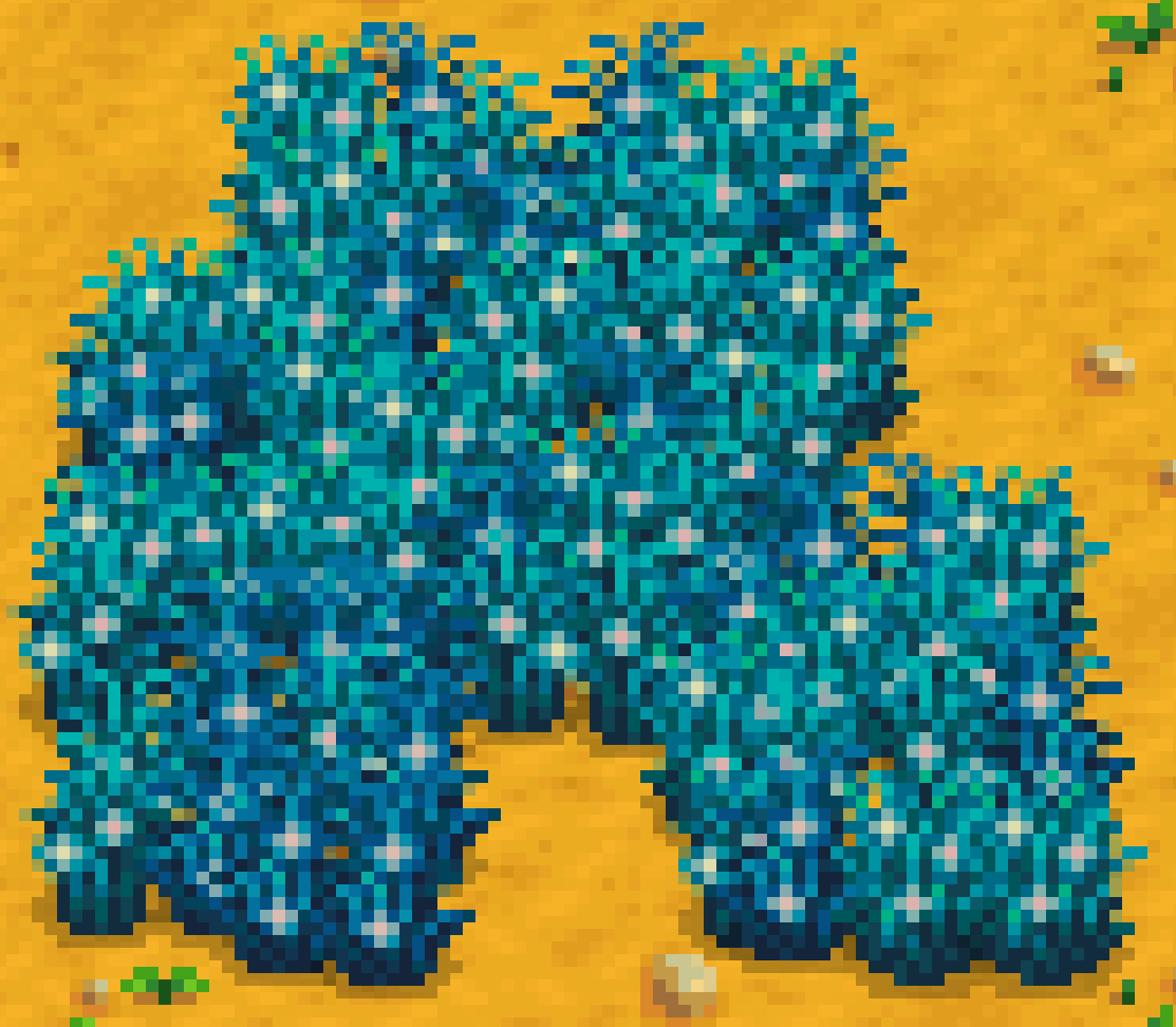 Blue grass growing on soil in Stardew Valley.